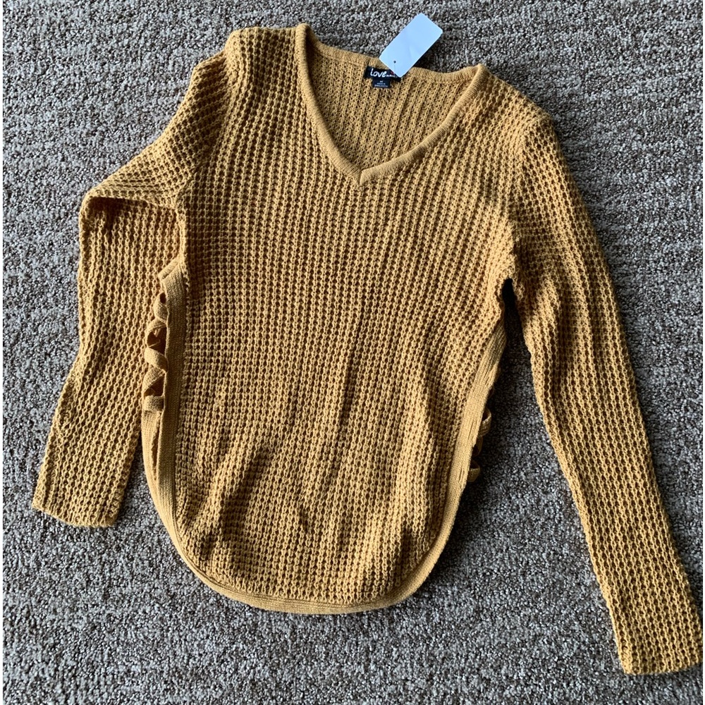 Mustard yellow sweater with open sides